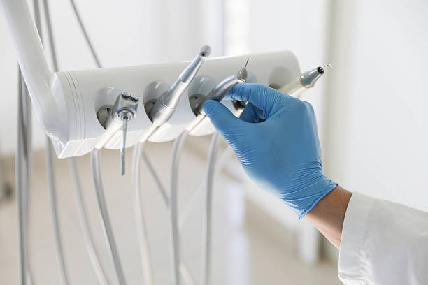 Professional Dental Implants technician working in Goodman, MO